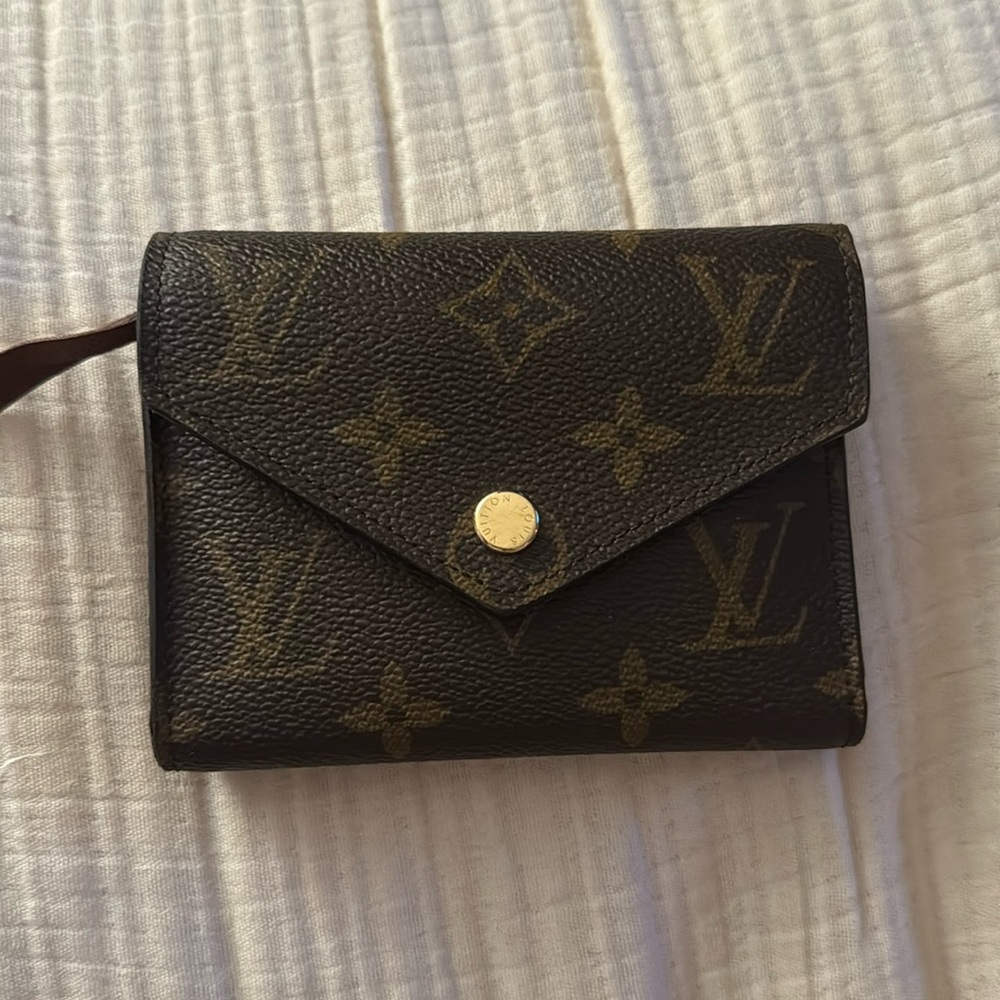 Genuine authentic leather Louis Vuitton Wallet.